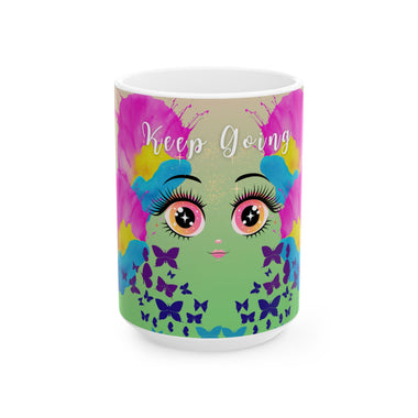Mug with colorful design of a face and butterflies, featuring the text 'Keep Going'.