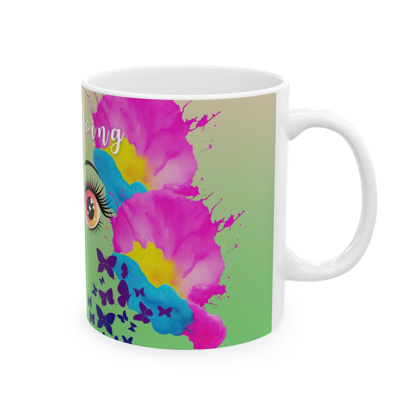 Mug with colorful design featuring a eye, butterflies, and text on a green background
