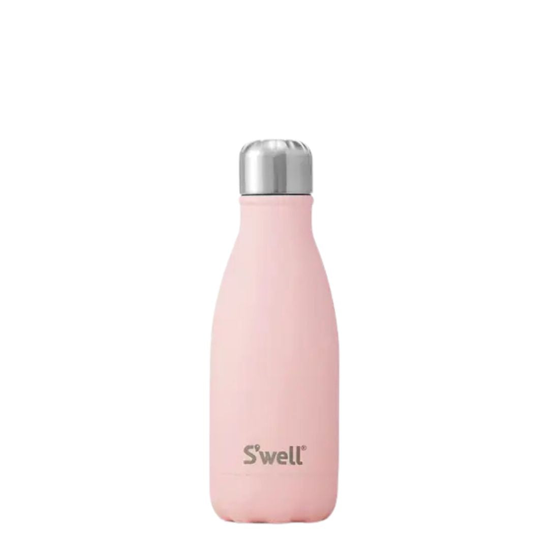 A pink S'well insulated stainless steel bottle with a silver cap.